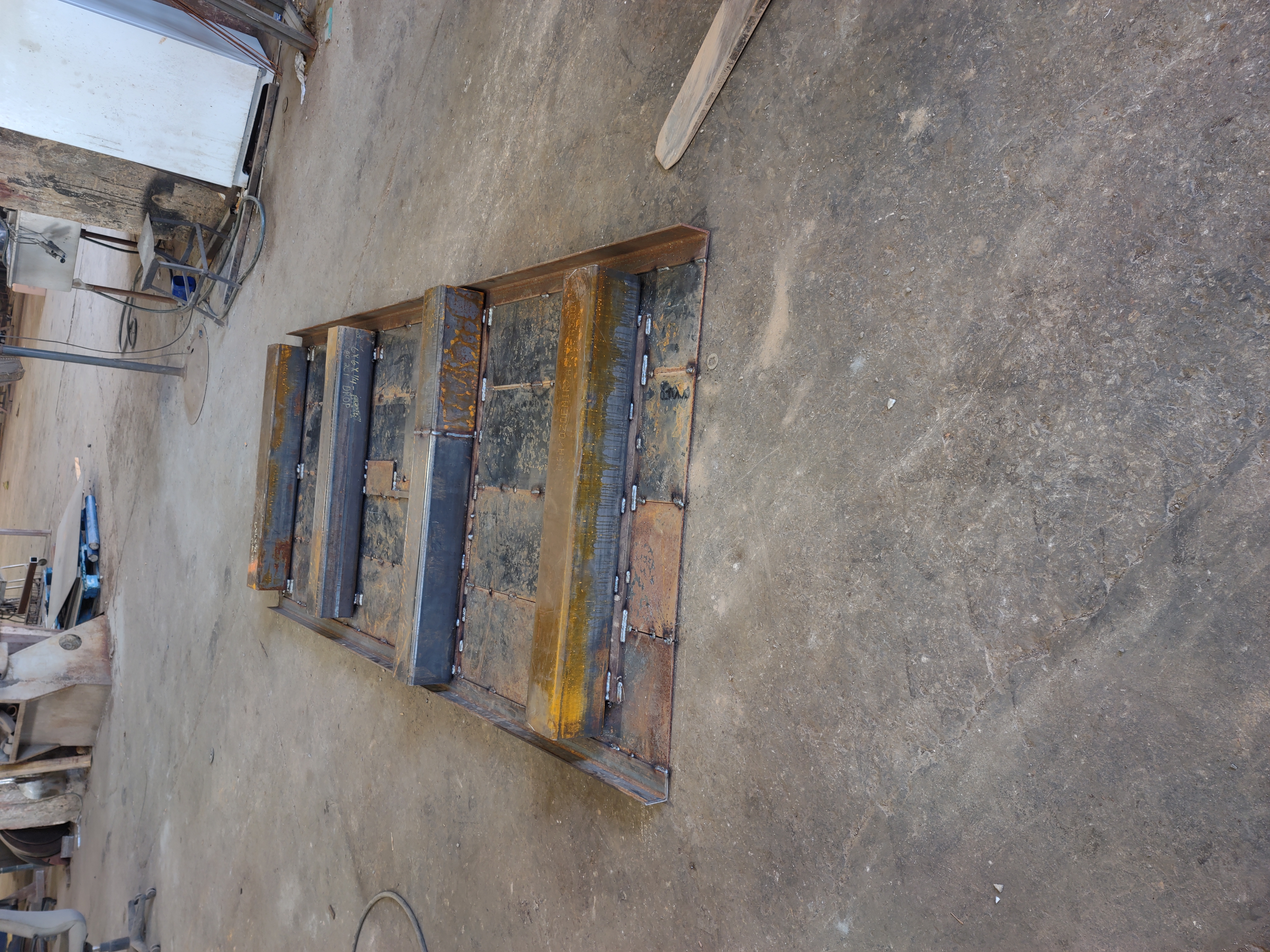 Welded steel skid base showing full-penetration joints and square frame